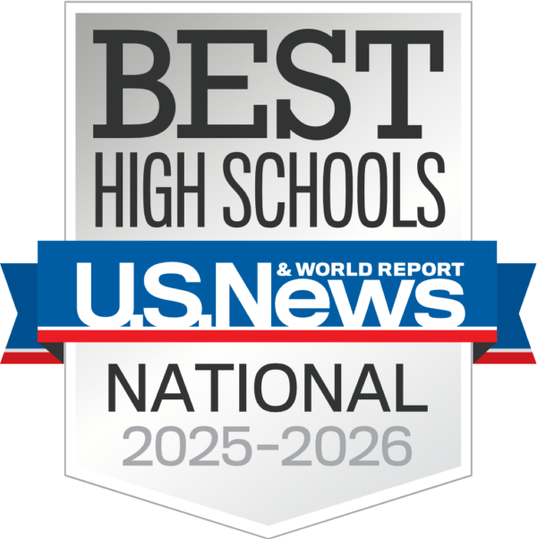 A badge displaying Best High Schools U.S. News & World Report National 2025-2026 in black, blue, red, and silver text on a shield-shaped background.