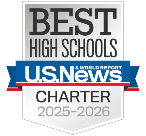 A silver badge with text: Best High Schools, U.S. News & World Report, and Charter 2025-2026, indicating a recognition for top charter high schools by U.S. News.